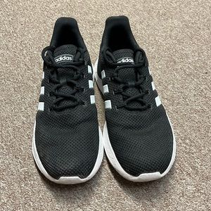 Black and white adidas shoes. Size is a mens 10